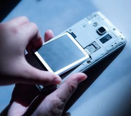 Loose Mobile Battery Repair Service at TechGuide